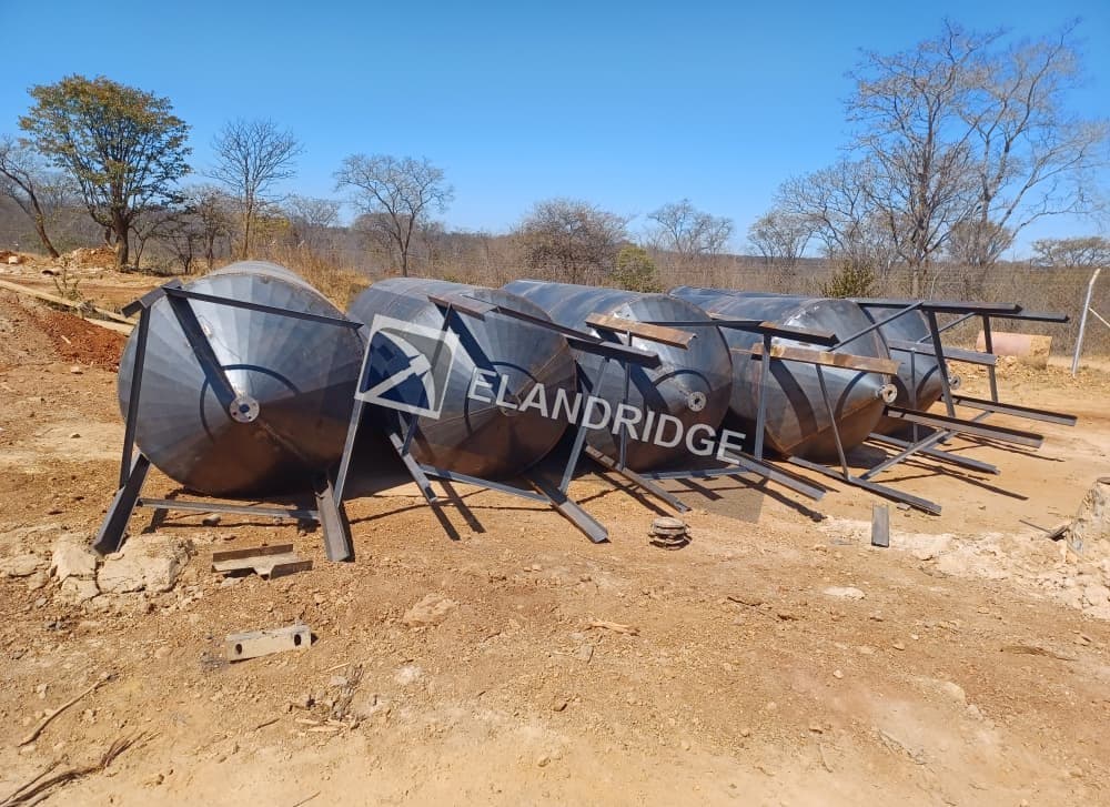 CIP tanks lying on their sides at Kambuzi before erection