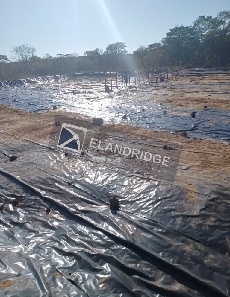 Lined process pond at Kambuzi Mine